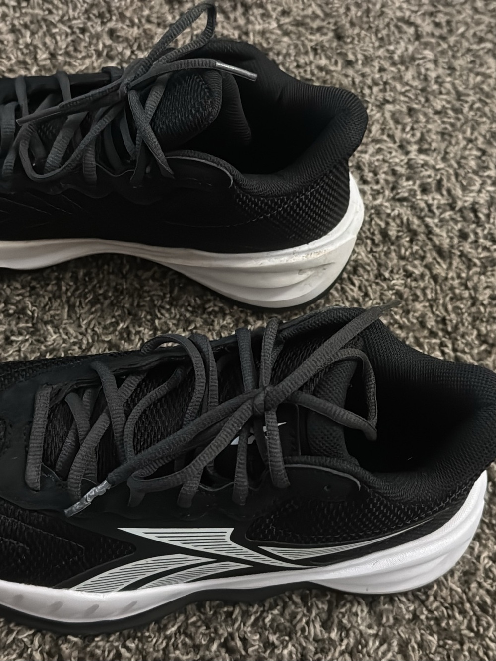 Reebok Men's Black Athletic Sneakers with White Accents